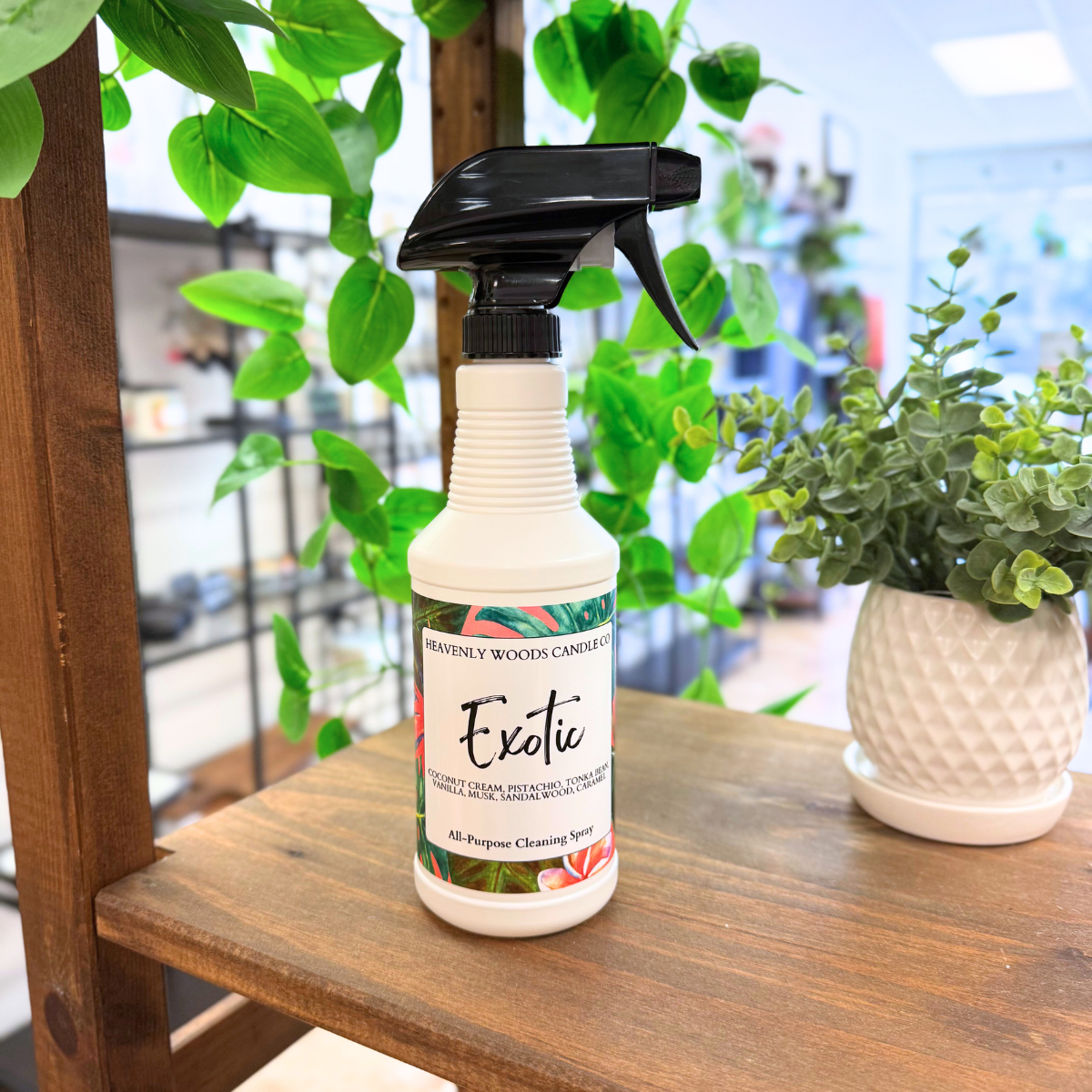 Exotic All-Purpose Cleaning Spray bottle by Heavenly Woods Candle Co with a sleek label design.