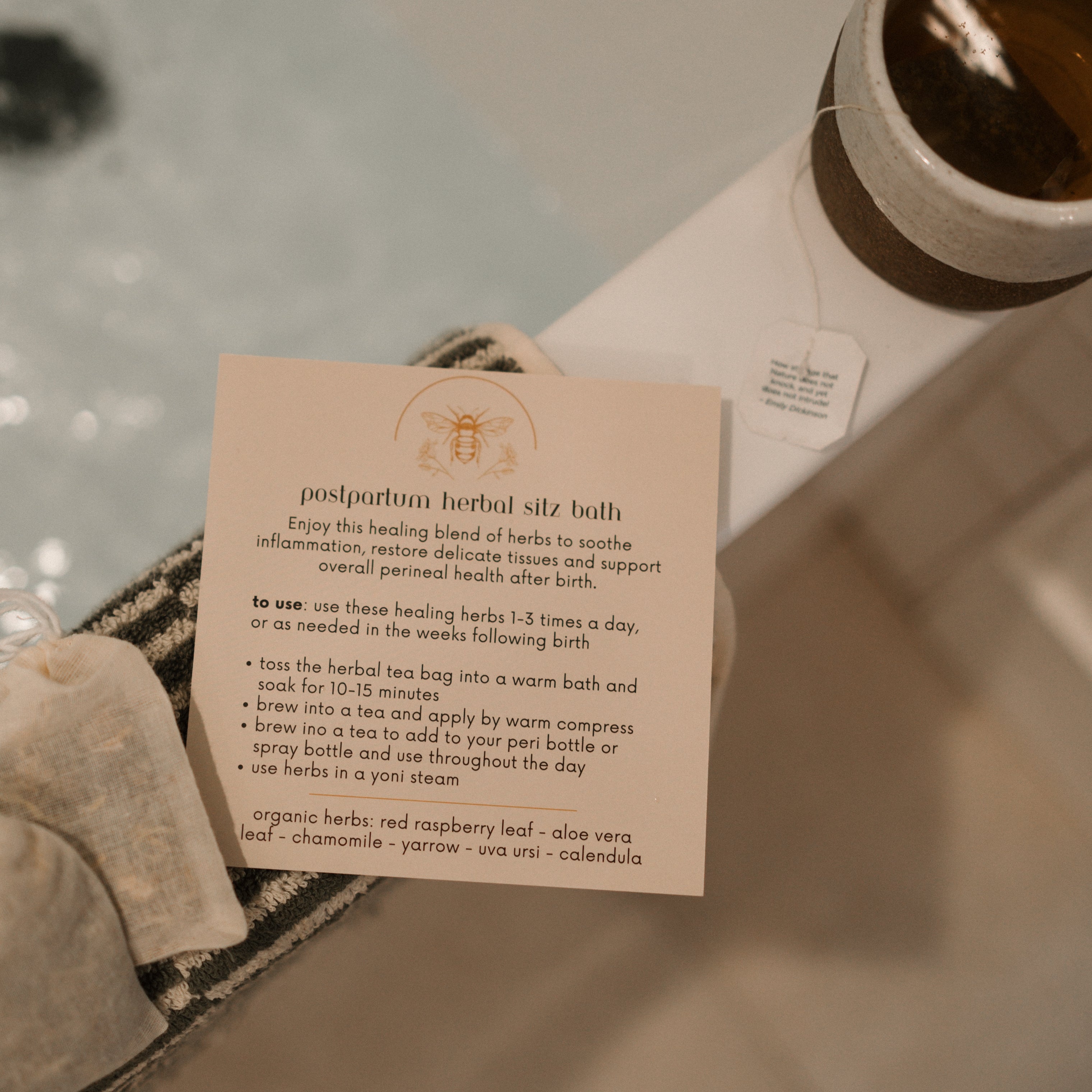 Herbal sitz bath by Honeybee Hippie, showing a calming herbal blend in a natural setting for postpartum care.