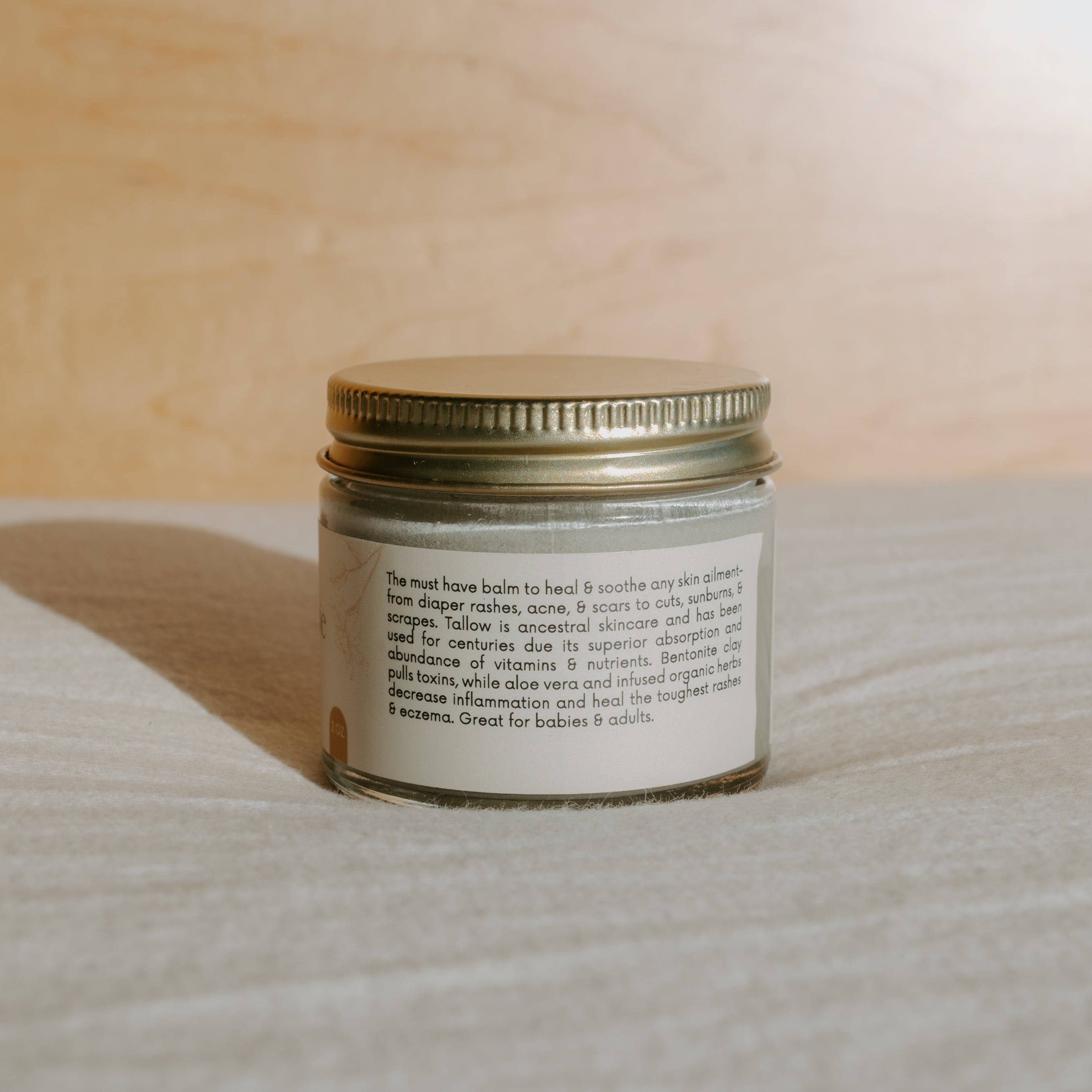 Honeybee Hippie Miracle Mud jar with label and natural ingredients, showcasing the skincare product in a clear container