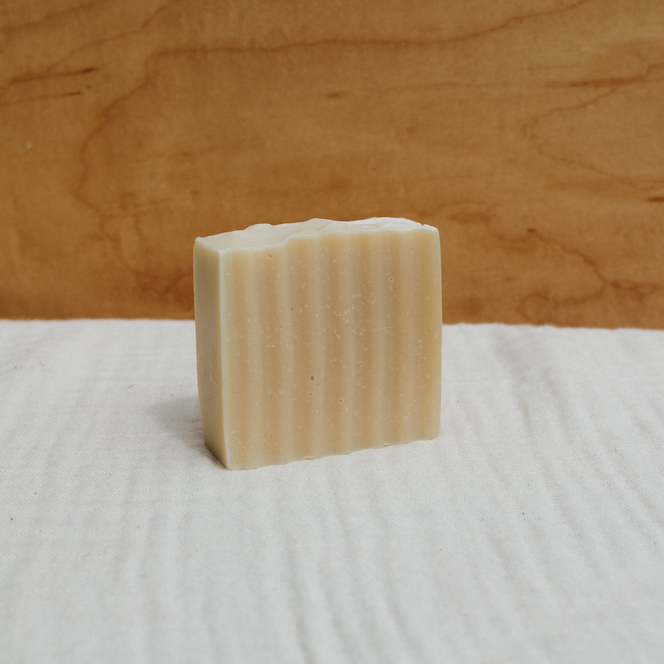 Honeybee Hippie Tallow Soap Bar featuring a natural, handcrafted soap with honeybee-inspired ingredients and rustic packaging.