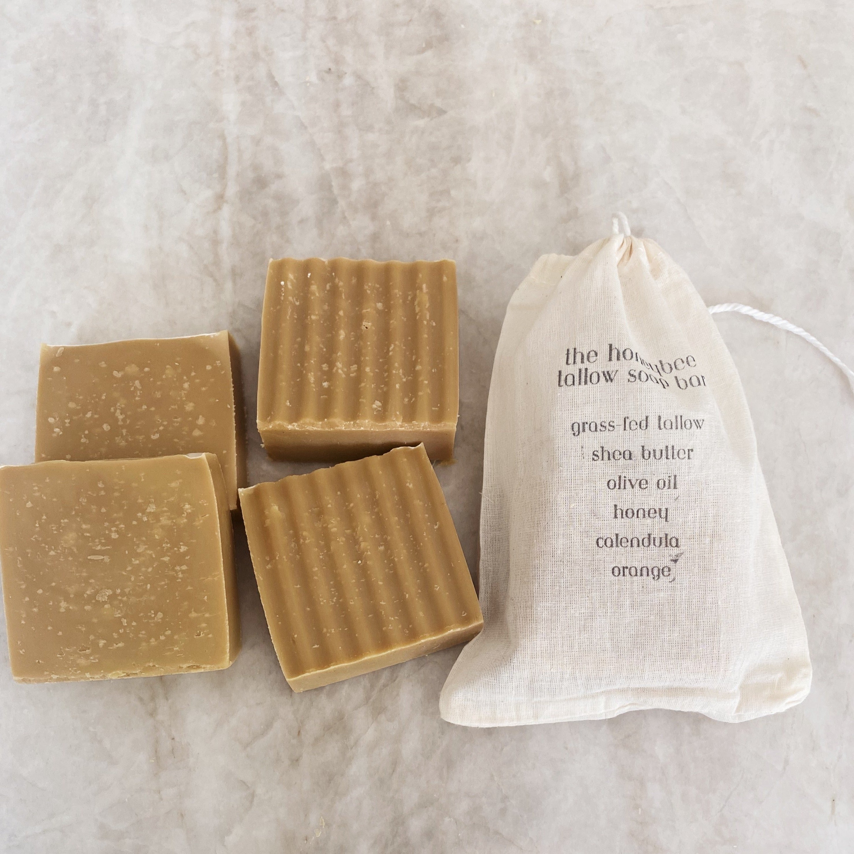 Honeybee Hippie Tallow Soap Bar showing a natural soap bar with honeybee branding and rustic packaging, ready for next drop.
