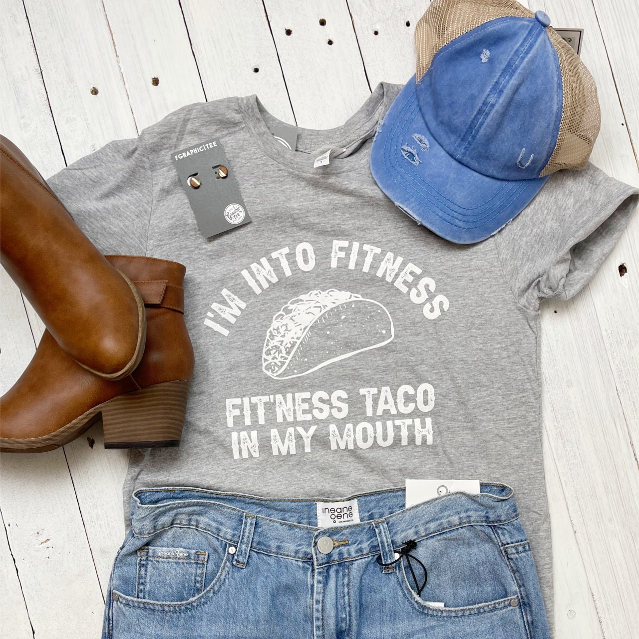 Gray short sleeve graphic tee from The Graphic Tee featuring a fun "I'm Into Fitness Taco" design on the front.