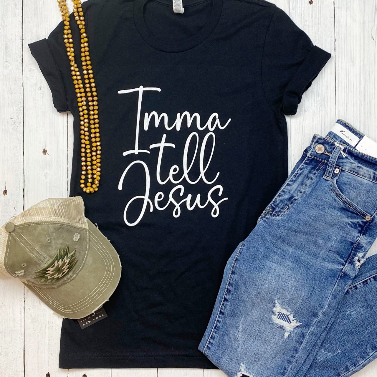 Unisex graphic T-shirt from The Graphic Tee featuring the "Imma Tell Jesus" design on a casual short-sleeve tee.