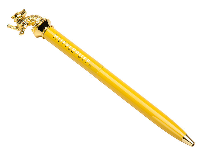 Hufflepuff Harry Potter softcover journal with flexible cover and pen, featuring the house crest and gold accents.