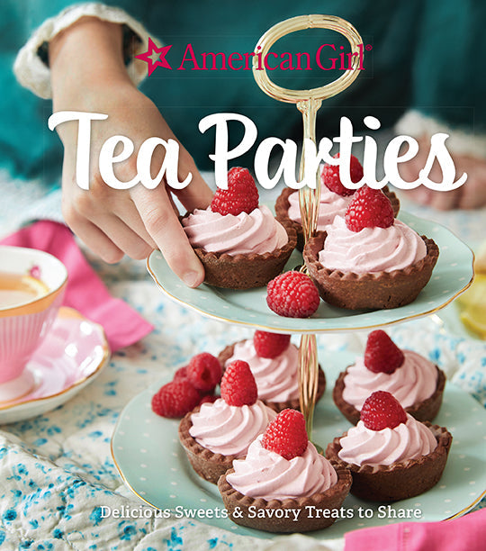 Hardcover book titled "American Girl Tea Parties" by Insight Editions, featuring colorful illustrations of tea party scenes.