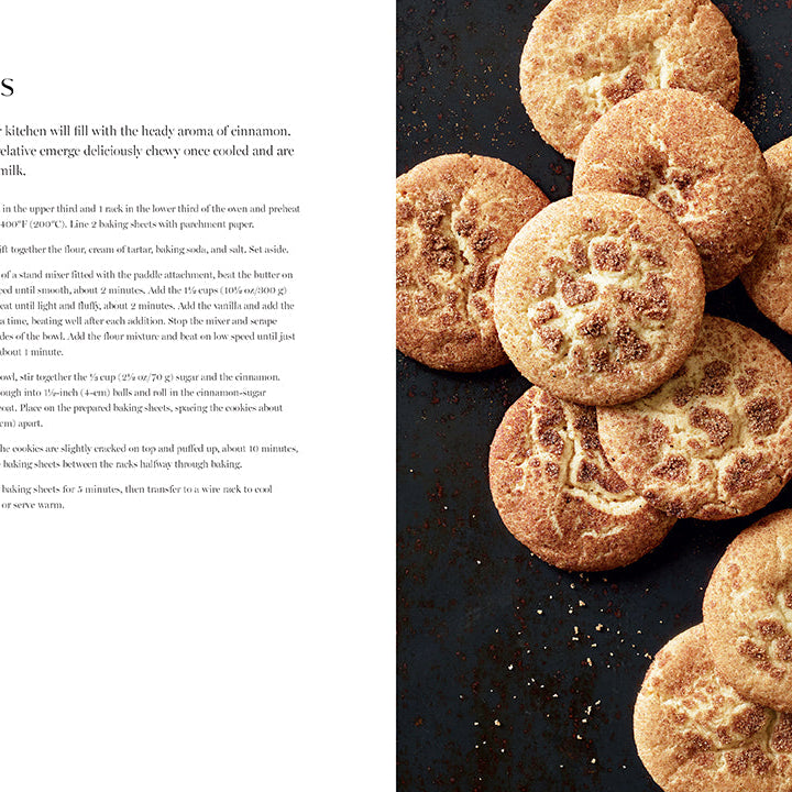 Hardcover baking cookbook titled Baking Favorites by Insight Editions, featuring a close-up of colorful baked goods on the cover.