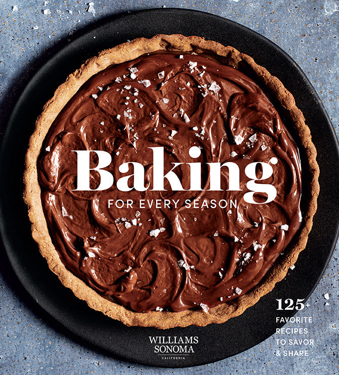 Hardcover cookbook titled Baking for Every Season by Insight Editions, featuring seasonal baking recipes and colorful food photography.