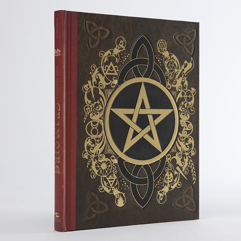 Hardcover of Buffy the Vampire Slayer: The Official Grimoire by Insight Editions, featuring mystical illustrations and detailed lore.