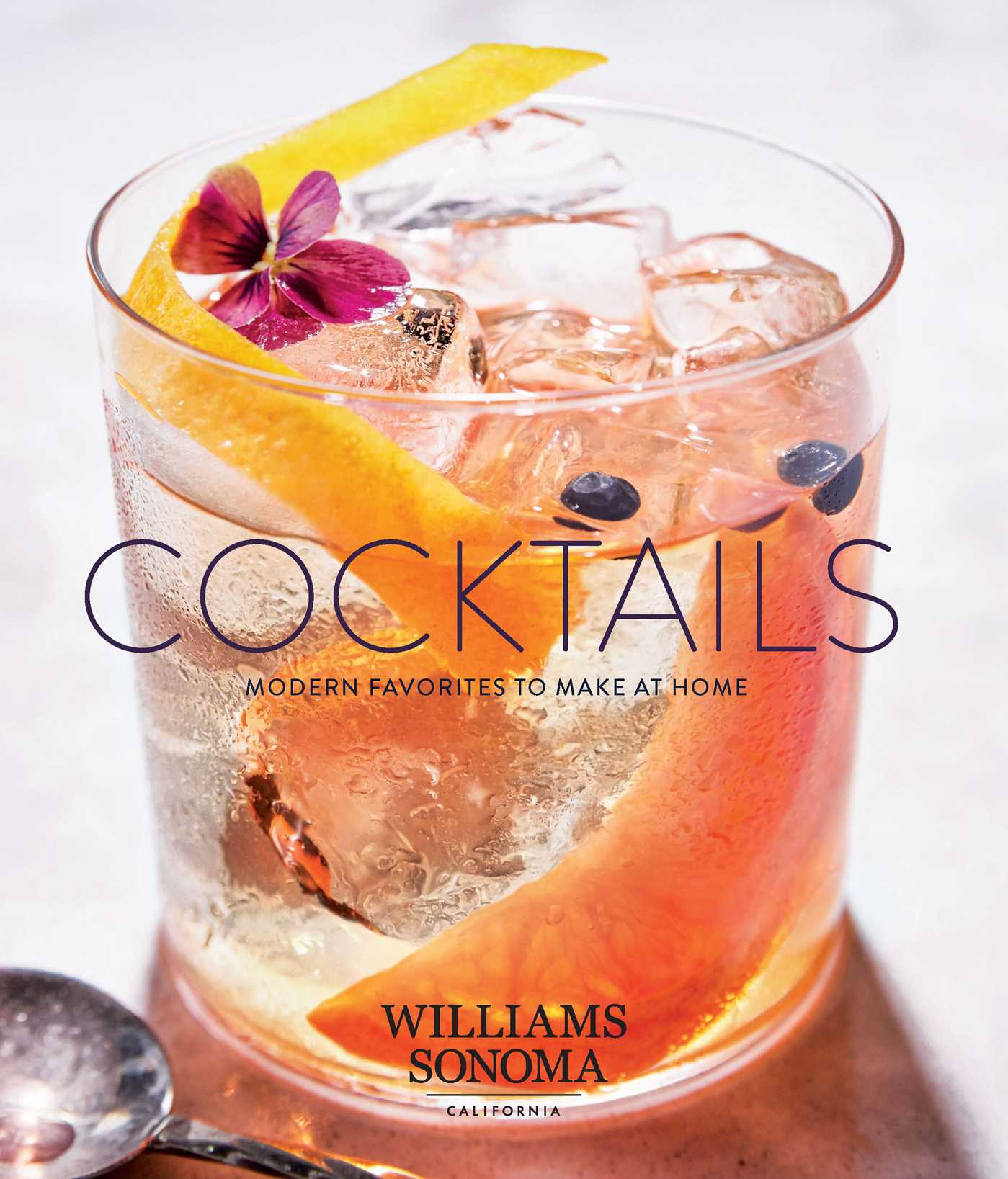 Hardcover book titled "Cocktails" by Insight Editions featuring colorful illustrations of various cocktail recipes.
