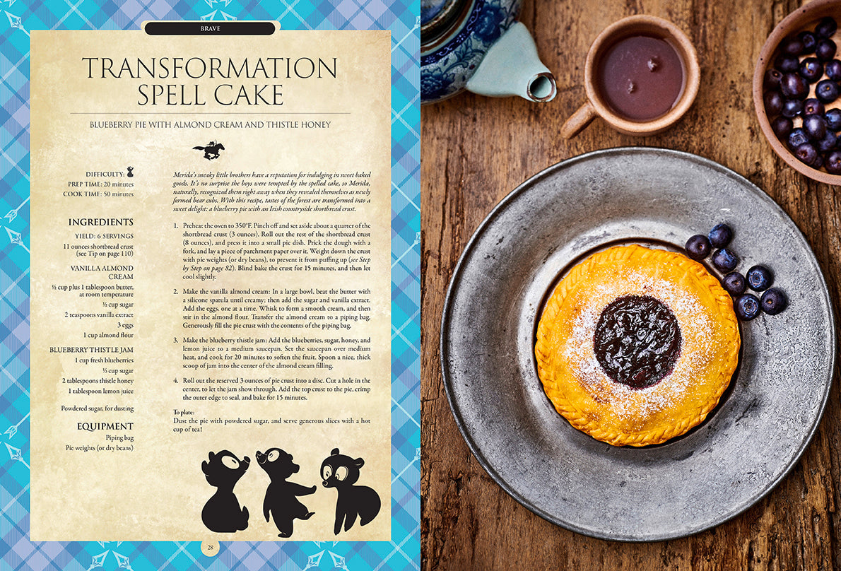 Hardcover Disney Enchanted Baking book by Insight Editions featuring magical baking recipes and whimsical illustrations.
