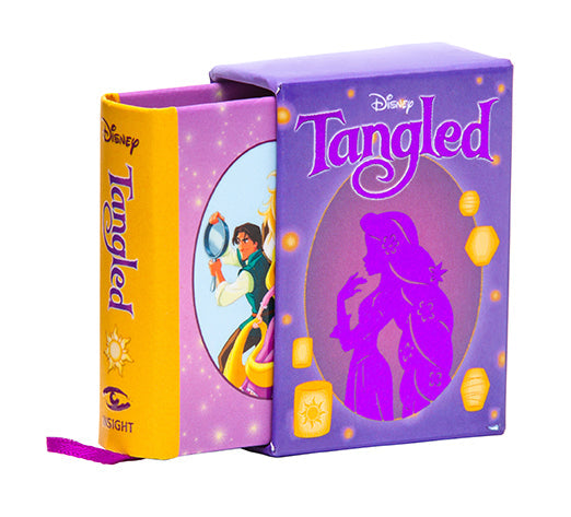 Hardcover Disney Tangled book by Insight Editions featuring illustrations and story content from the animated film.