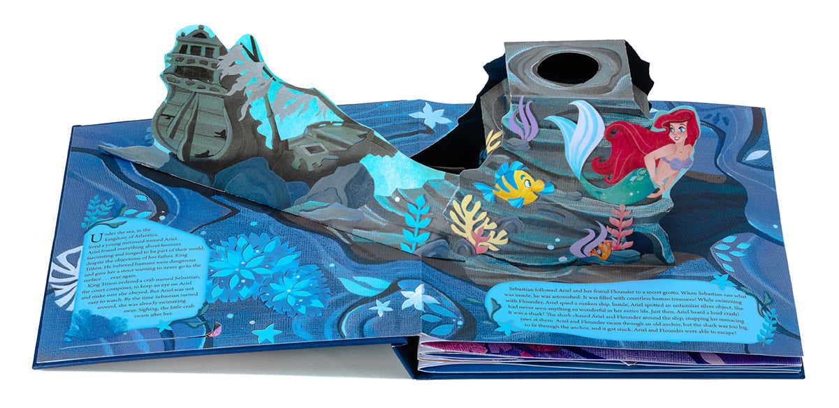 Hardcover Disney The Little Mermaid pop-up book by Insight Editions showing colorful underwater scene with mermaid and sea creatures.