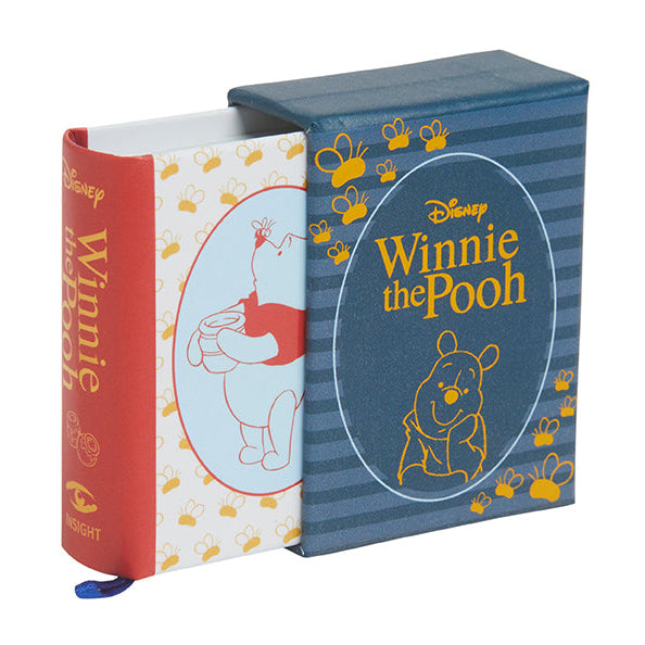 Hardcover Disney Winnie the Pooh book by Insight Editions with colorful illustrated cover featuring Pooh bear.