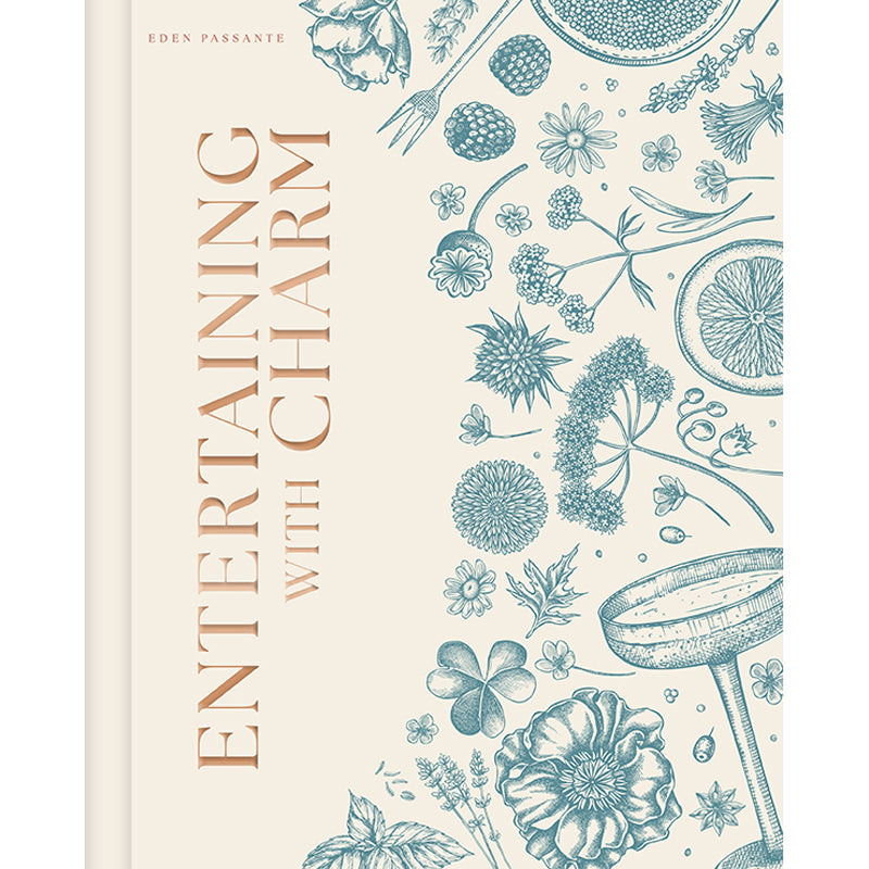 Hardcover book titled "Entertaining with Charm" by Insight Editions, featuring a charming cover design.