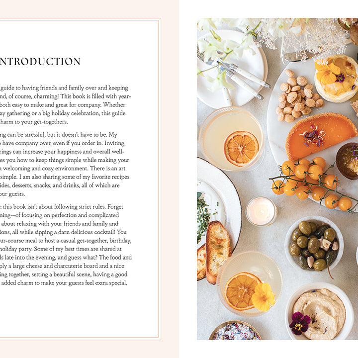 Hardcover book titled "Entertaining with Charm" by Insight Editions, featuring decorative interior pages and charming design elements.