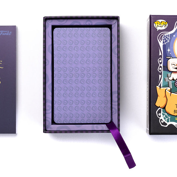 Hardcover Insight Editions Funko The Nightmare Before Christmas Tarot Deck and Guidebook with illustrated cover and detailed cards inside.