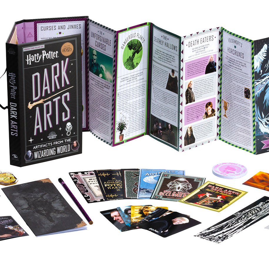 Inside view of the hardcover Harry Potter: Dark Arts book by Insight Editions, showcasing detailed illustrations and dark magical artwork.