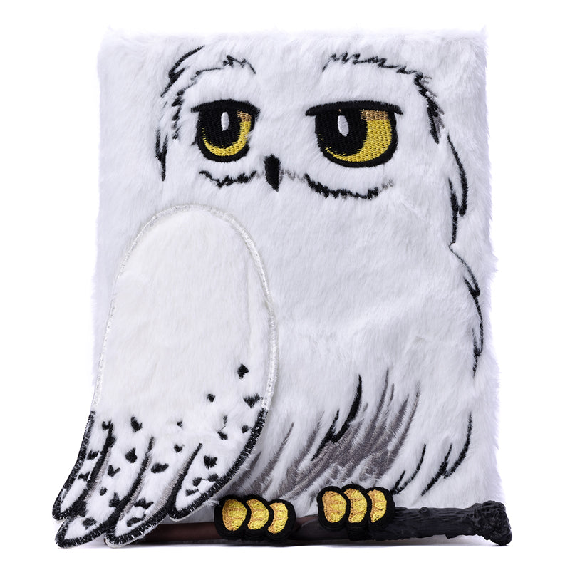 Harry Potter Hedwig plush journal by Insight Editions, hardcover with a soft Hedwig owl design for writing and notes.