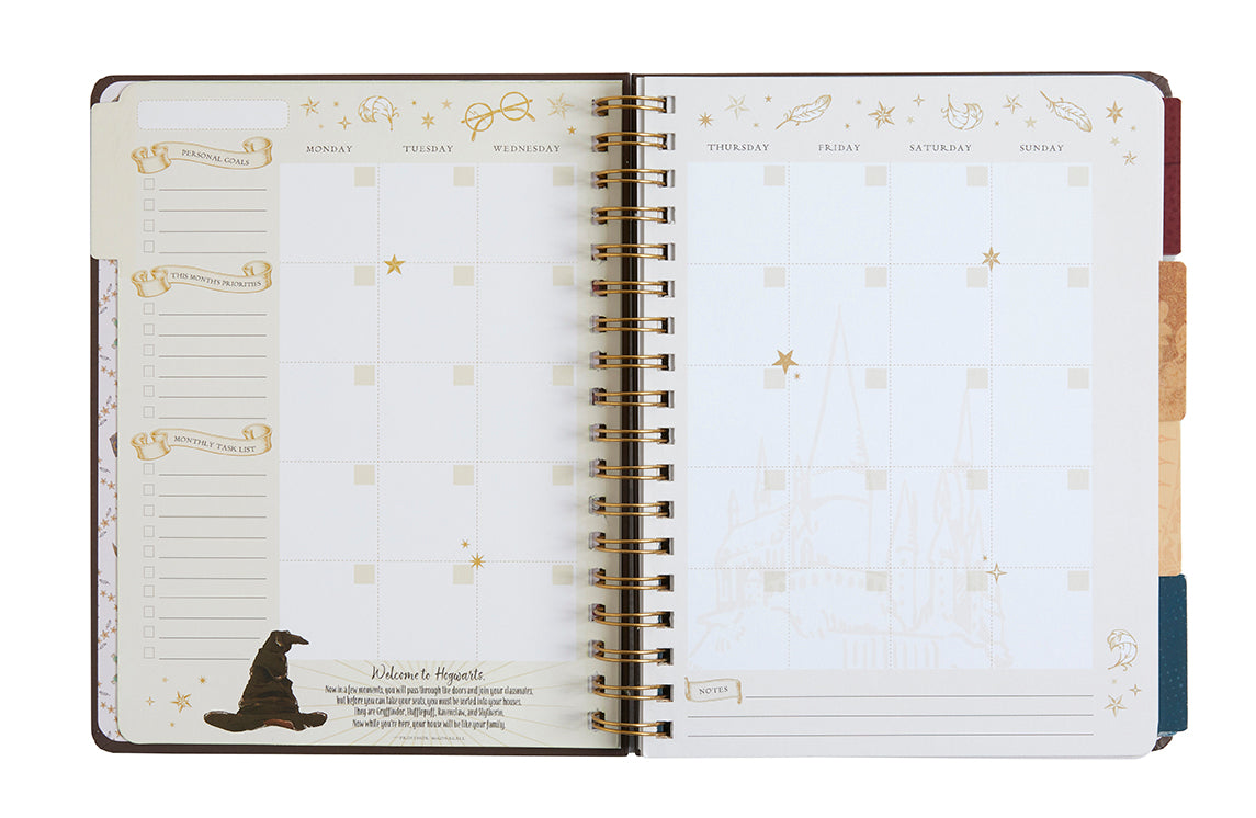 Hardcover Harry Potter Hogwarts 12-Month Undated Planner by Insight Editions with wizard-themed cover design.