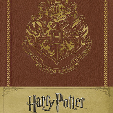 Harry Potter Hogwarts hardcover ruled journal by Insight Editions featuring a magical cover design and lined pages for writing.