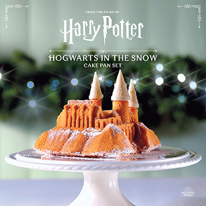 Hardcover Harry Potter Hogwarts in the Snow cake pan set by Insight Editions, featuring detailed Harry Potter-themed baking molds.