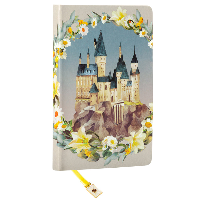 Hardcover Harry Potter Hogwarts Magical World Journal by Insight Editions with ribbon charm and enchanted cover design.