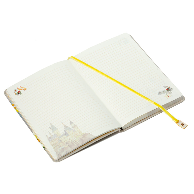 Hardcover Harry Potter Hogwarts Magical World Journal by Insight Editions with ribbon charm and enchanted-themed cover design.