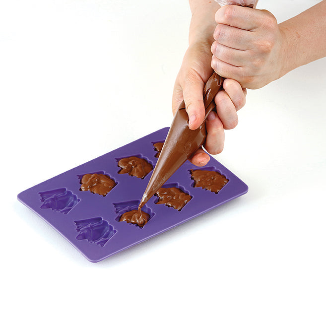 Hardcover Harry Potter "Make Your Own Chocolate Frogs" kit by Insight Editions with illustrated packaging.