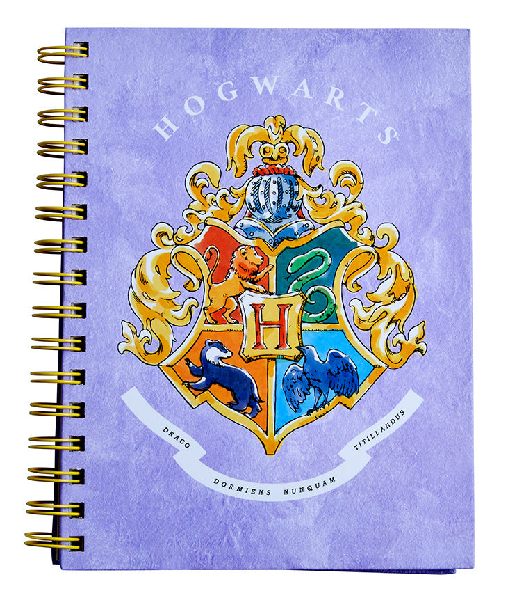 Hardcover Harry Potter spiral notebook by Insight Editions with magical-themed cover design and lined pages for writing.