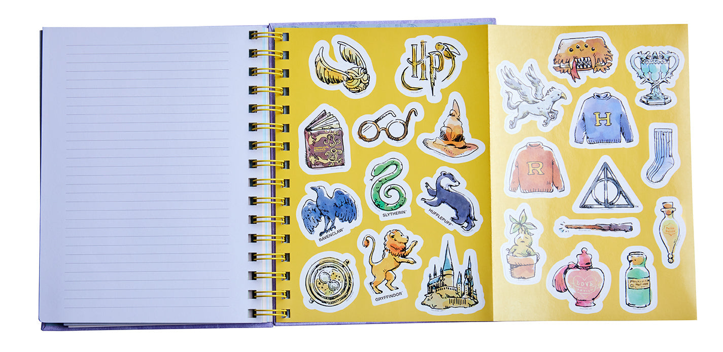 Hardcover Harry Potter spiral notebook by Insight Editions with magical-themed cover design and lined pages inside.