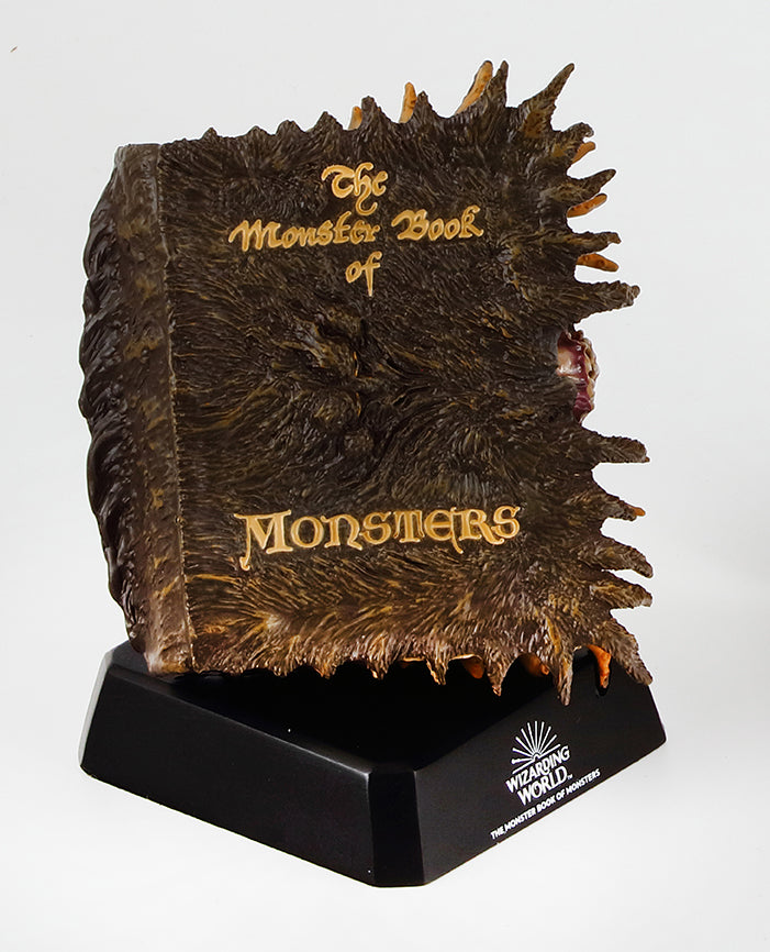 Hardcover Harry Potter Monster Book of Monsters model and book by Insight Editions with detailed cover and spine features.