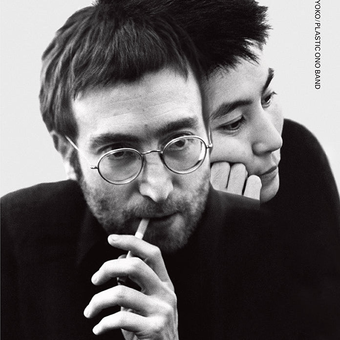 Hardcover book titled "John & Yoko Plastic Ono Band" by Insight Editions, featuring a cover image with artwork related to the band.