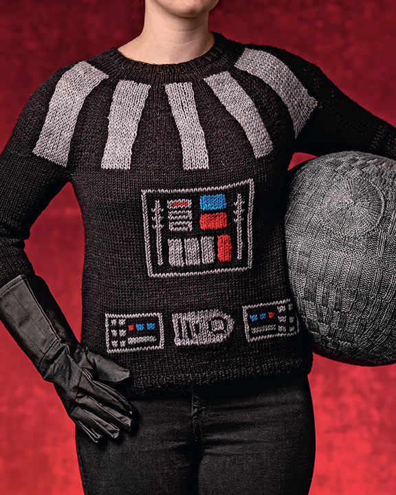 Hardcover copy of Star Wars: Knitting the Galaxy by Insight Editions featuring a galaxy-themed cover design.