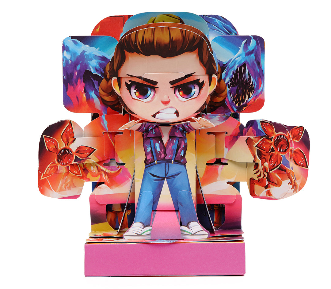 Hardcover Stranger Things Flip Pop: Eleven by Insight Editions, featuring a colorful illustration of Eleven from the popular series.