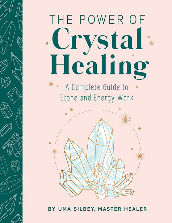 Hardcover book titled "The Power of Crystal Healing" by Insight Editions featuring a colorful crystal illustration on the cover.