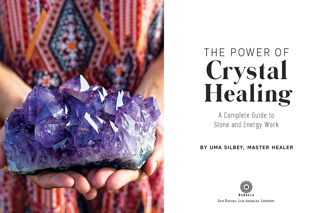 Interior view of the hardcover book "The Power of Crystal Healing" by Insight Editions, featuring colorful crystal illustrations.