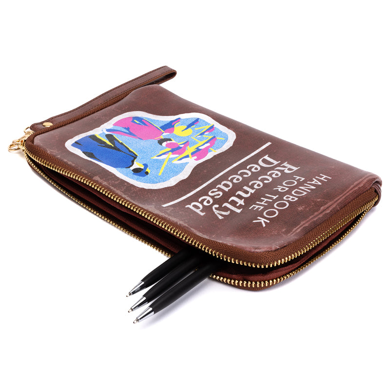 Beetlejuice Handbook for the Recently Deceased accessory pouch, Insight Editions home goods with spooky design and zipper closure.