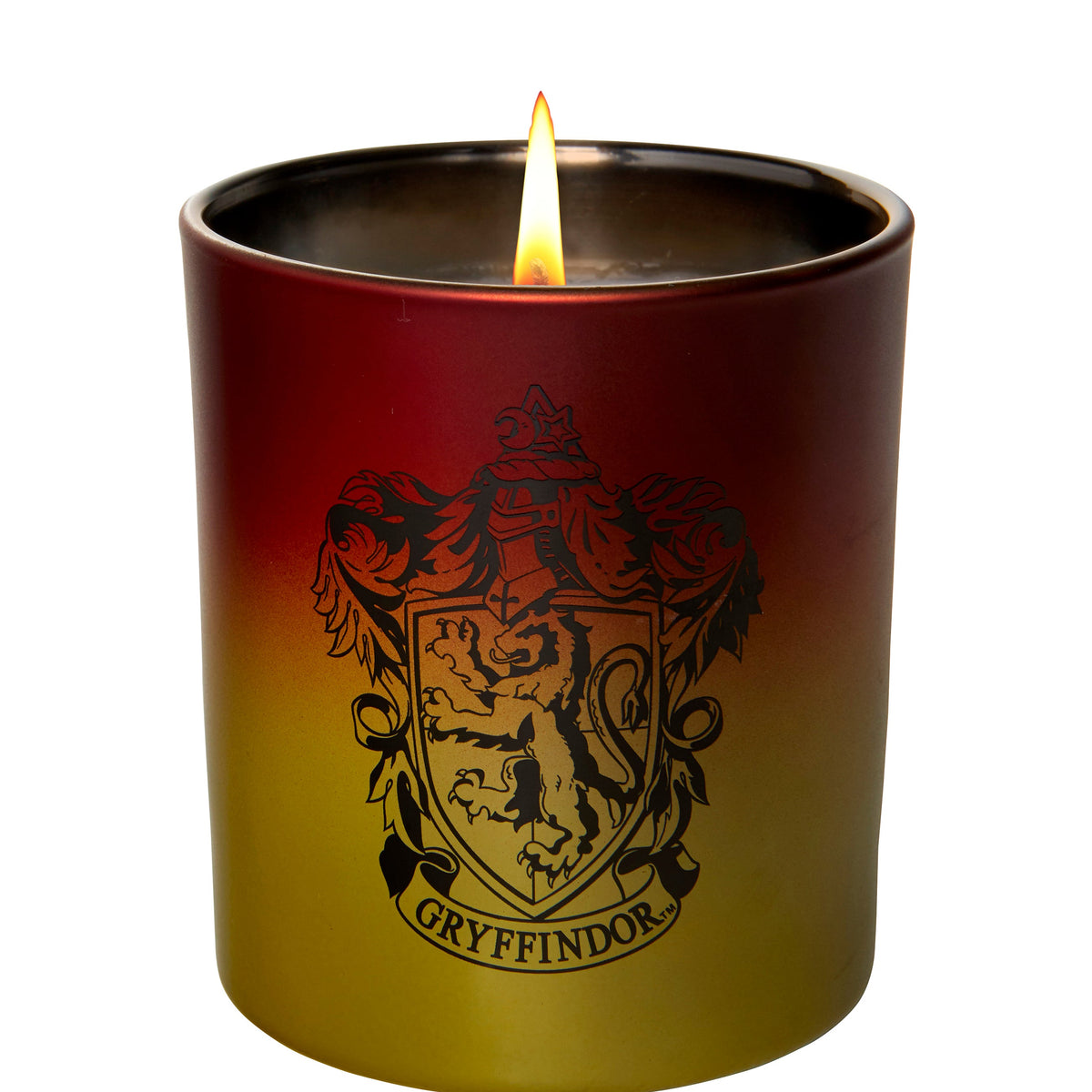 Gryffindor glass candle from Harry Potter home goods collection by Insight Editions, featuring a decorative candle inside a clear glass.