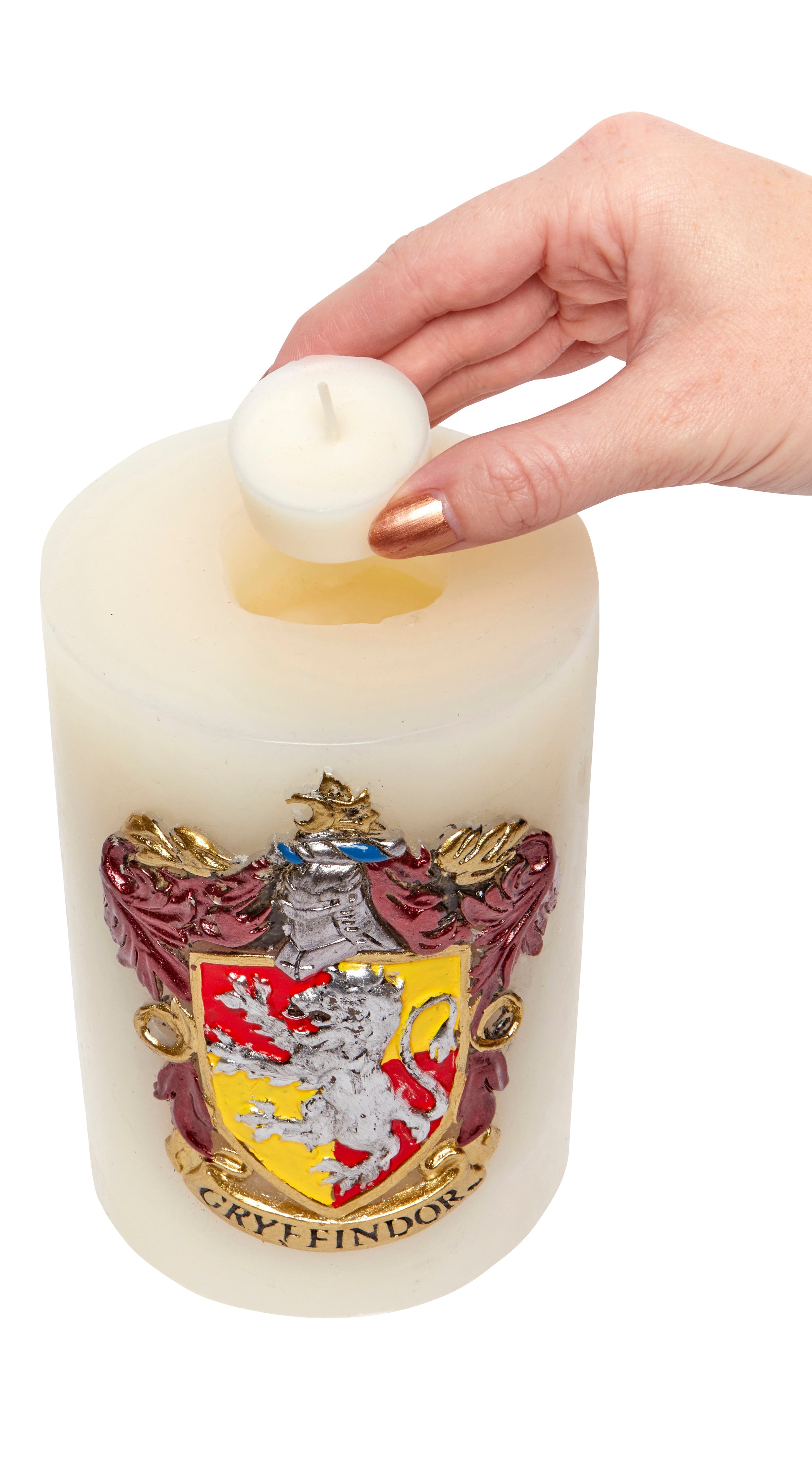 Gryffindor insignia sculpted candle from Harry Potter series, featuring detailed house crest on a decorative home decor item.