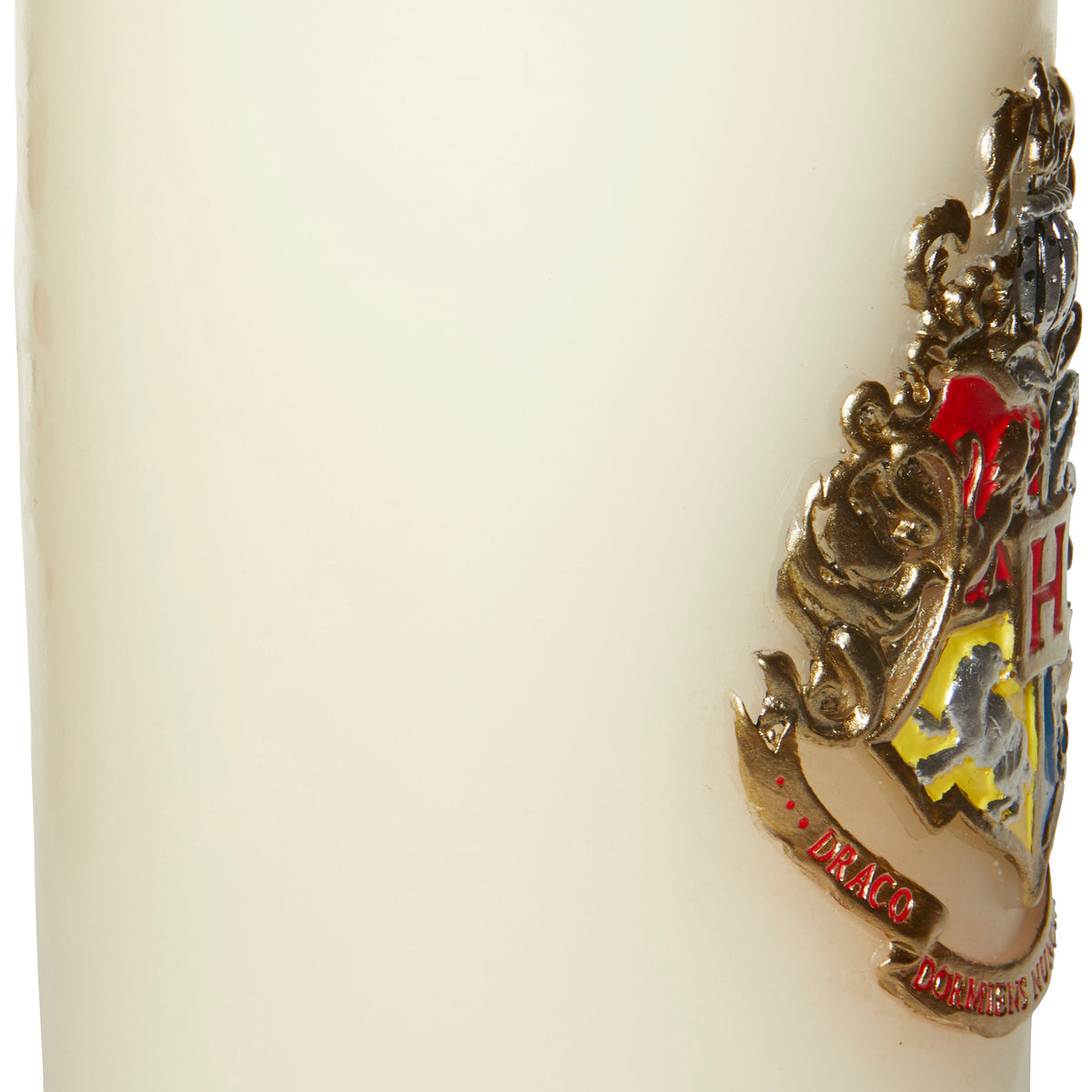 Large Harry Potter Hogwarts insignia candle by Insight Editions, featuring detailed sculpted design perfect for home decor.