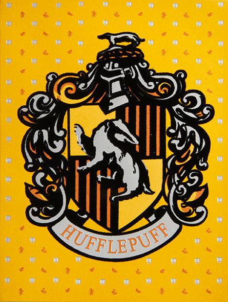 Hufflepuff embellished Harry Potter card with house emblem and decorative details, ideal for home decor or collection.