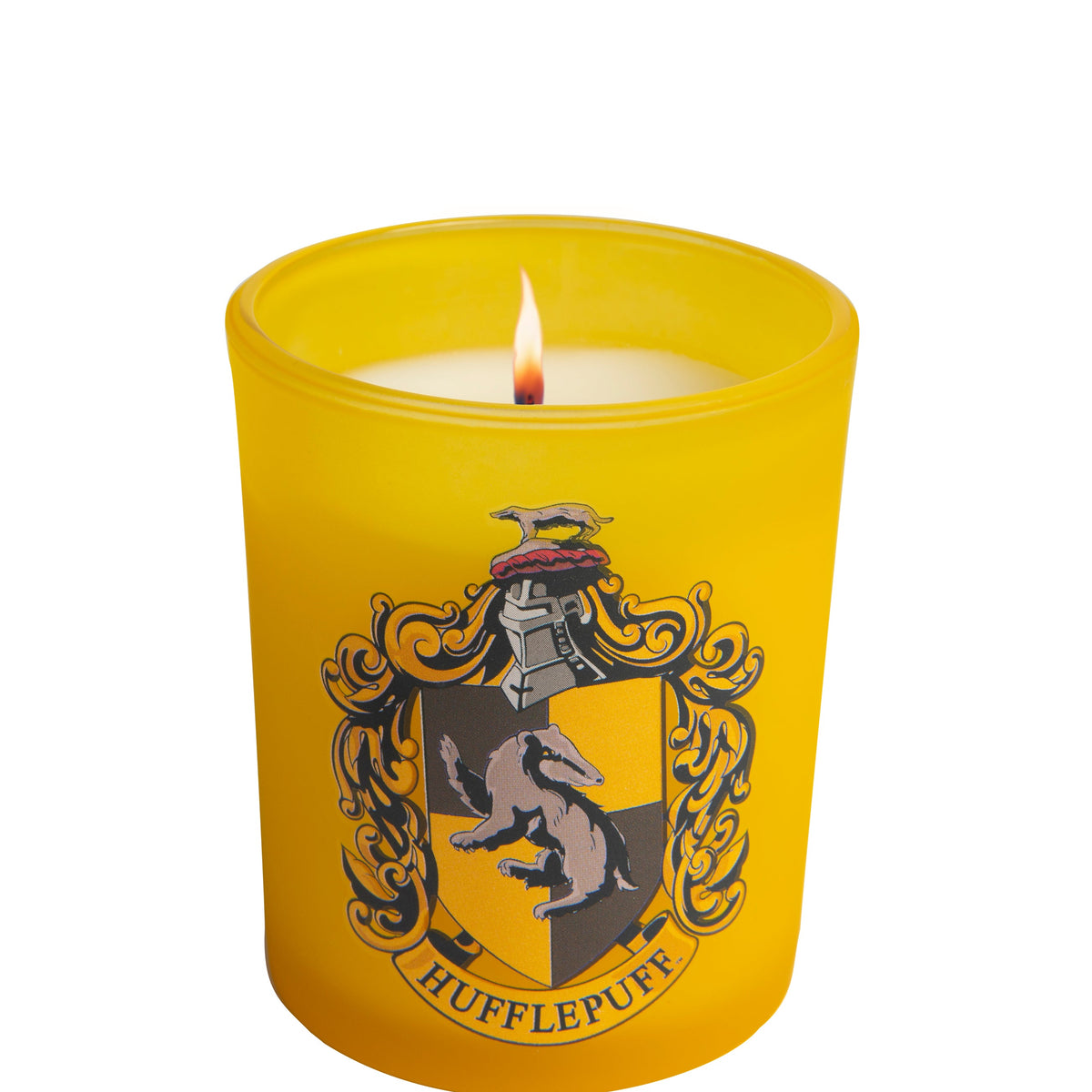 Hufflepuff glass votive candle from Harry Potter home goods collection by Insight Editions, featuring house crest design.