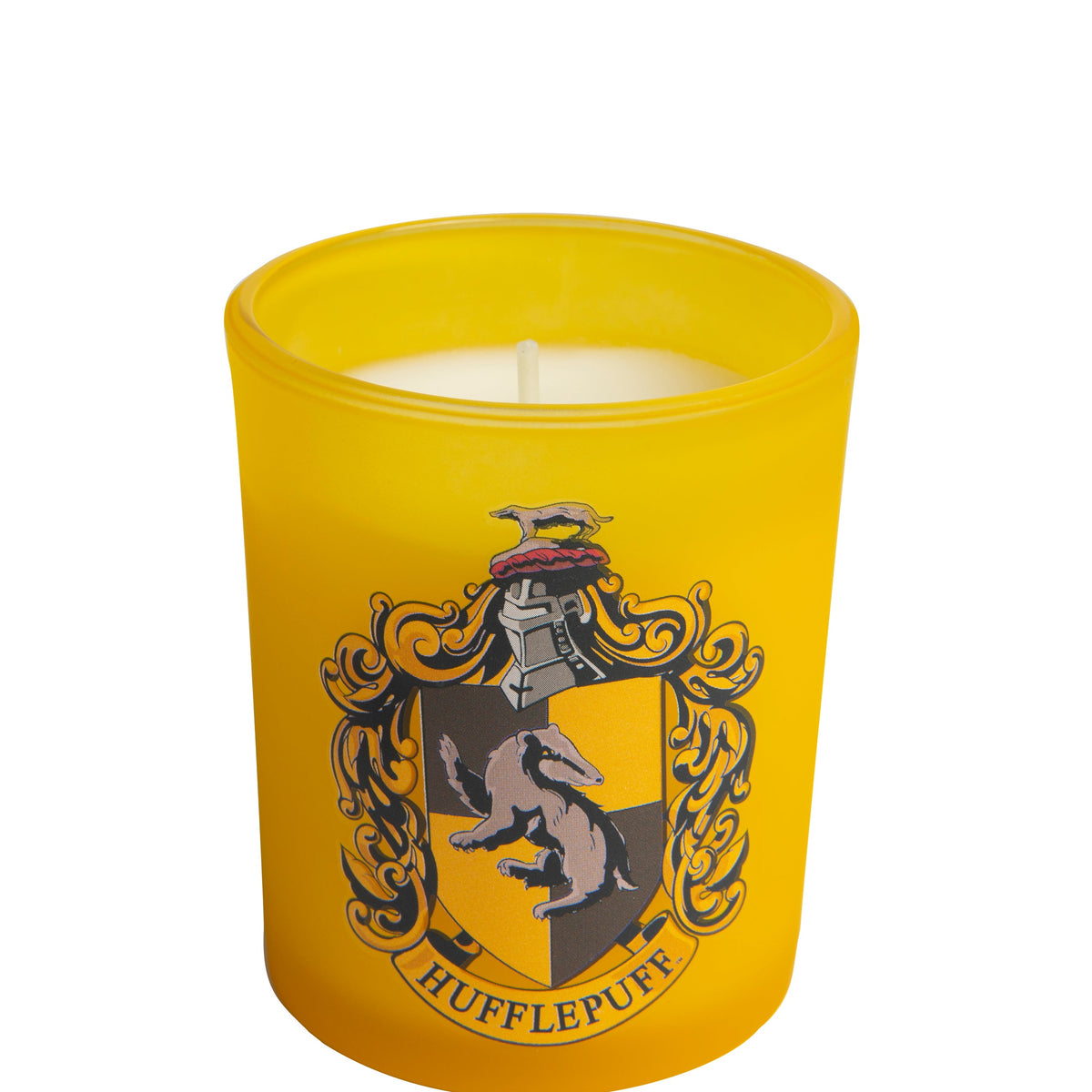 Hufflepuff glass votive candle from Harry Potter home goods by Insight Editions, featuring the Hufflepuff crest on clear glass.