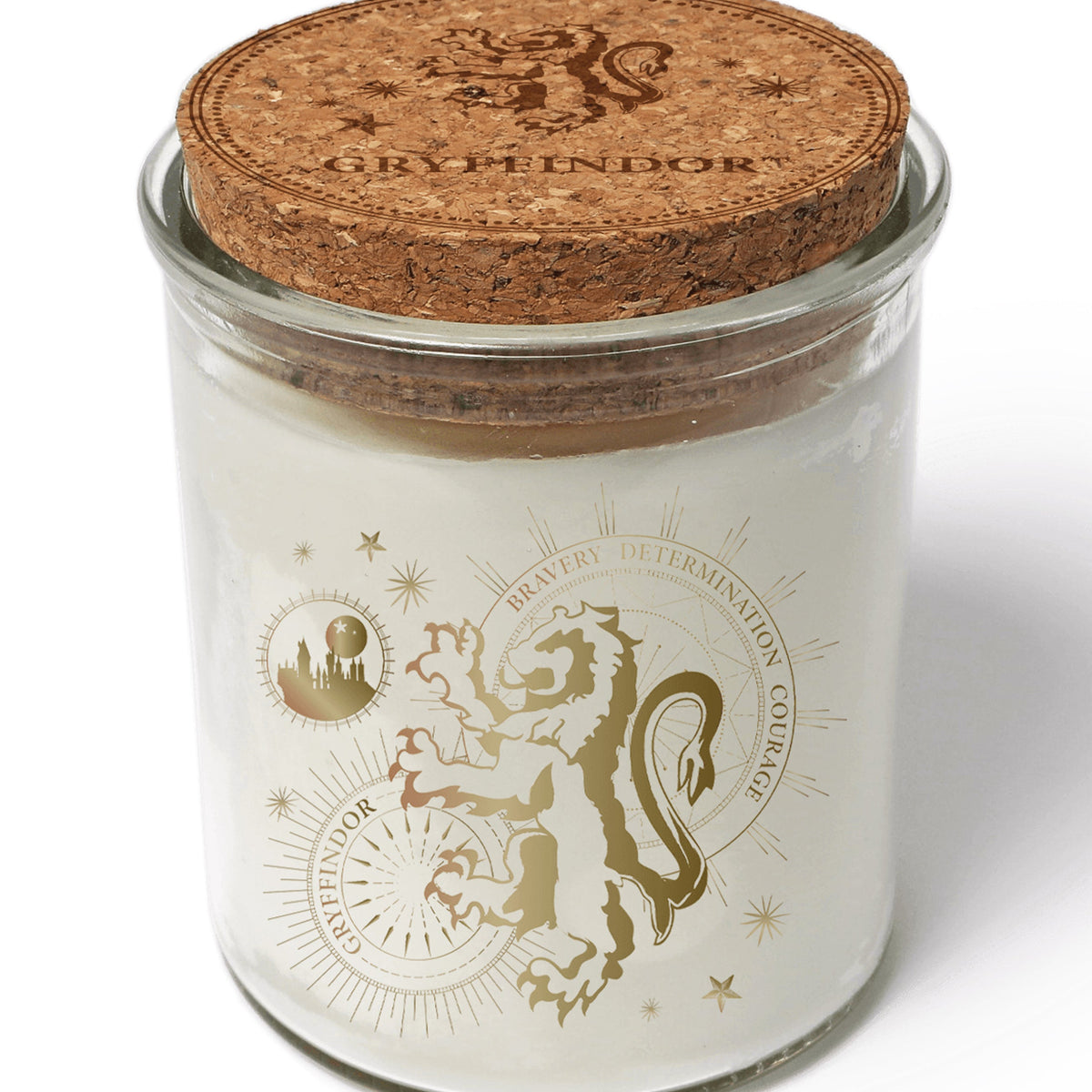 Color-changing Gryffindor candle from Harry Potter home goods collection by Insight Editions, showing a warm glow and magical design.