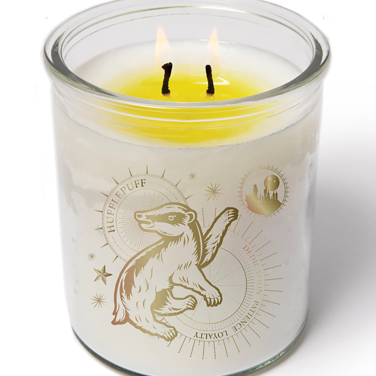 Color-changing Hufflepuff candle from Harry Potter by Insight Editions, depicting a magical, warm-lit wax candle in a home decor setting.