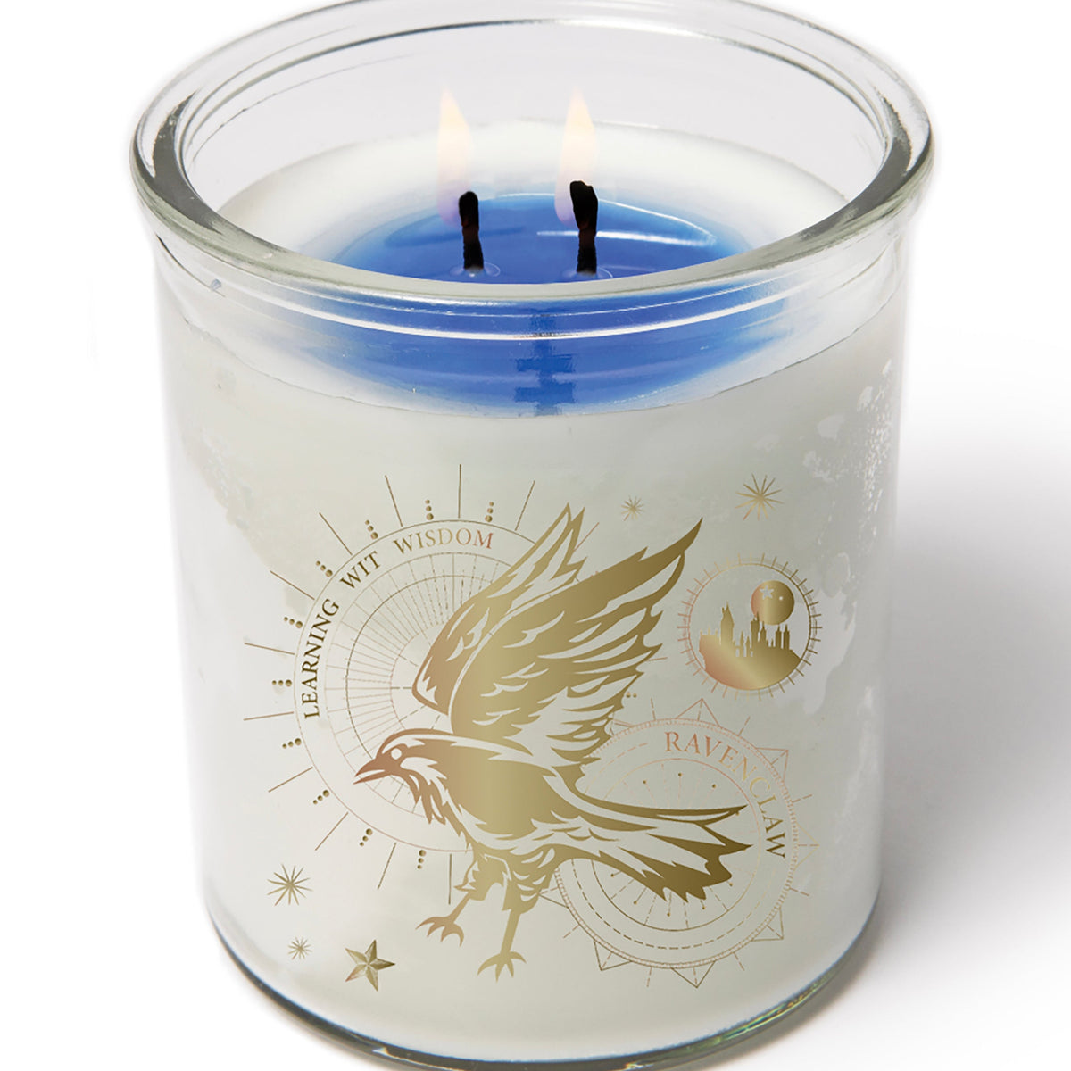 Color-changing Ravenclaw candle from Harry Potter by Insight Editions, featuring a magical design and intricate Ravenclaw house details.