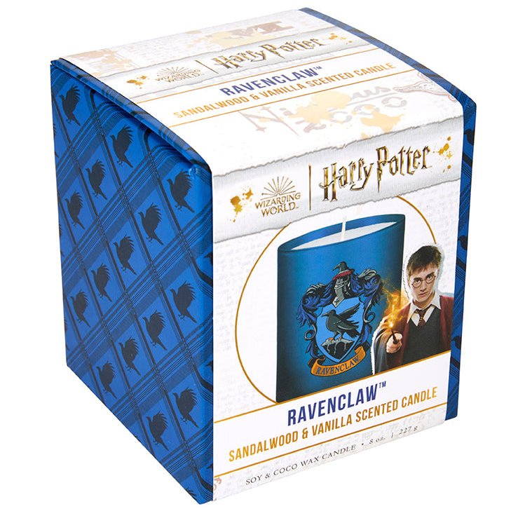 Ravenclaw scented glass candle from Harry Potter home goods collection, featuring the Ravenclaw crest and blue glass design.
