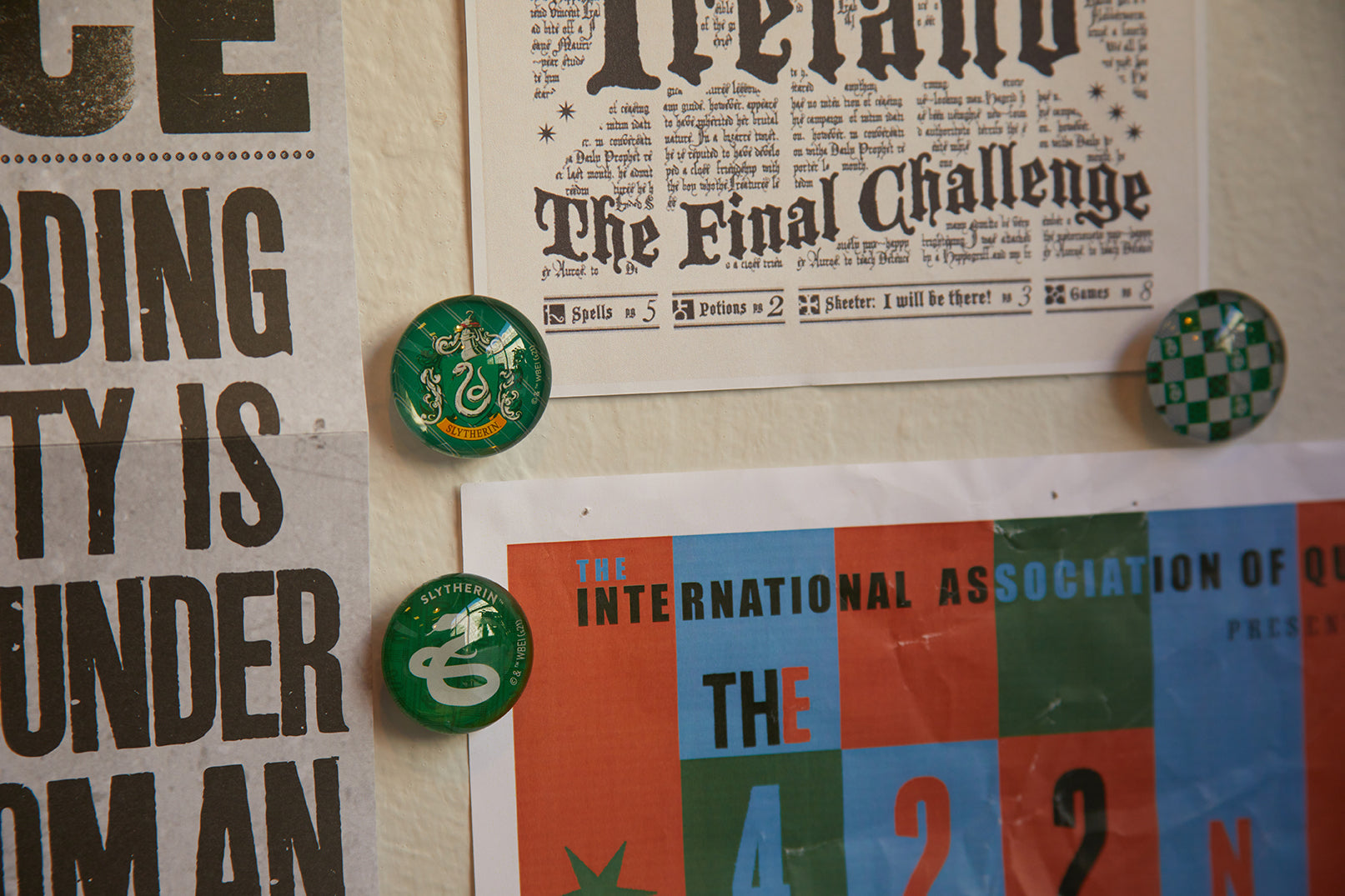 Set of six Slytherin glass magnets featuring Harry Potter house symbols, ideal for home decor or magnetic surfaces.