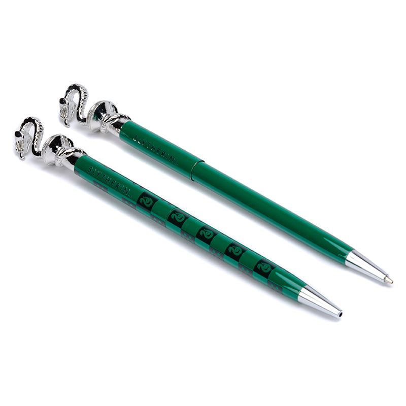 Harry Potter Slytherin pen and pencil set by Insight Editions, featuring green and silver themed writing tools on a display.