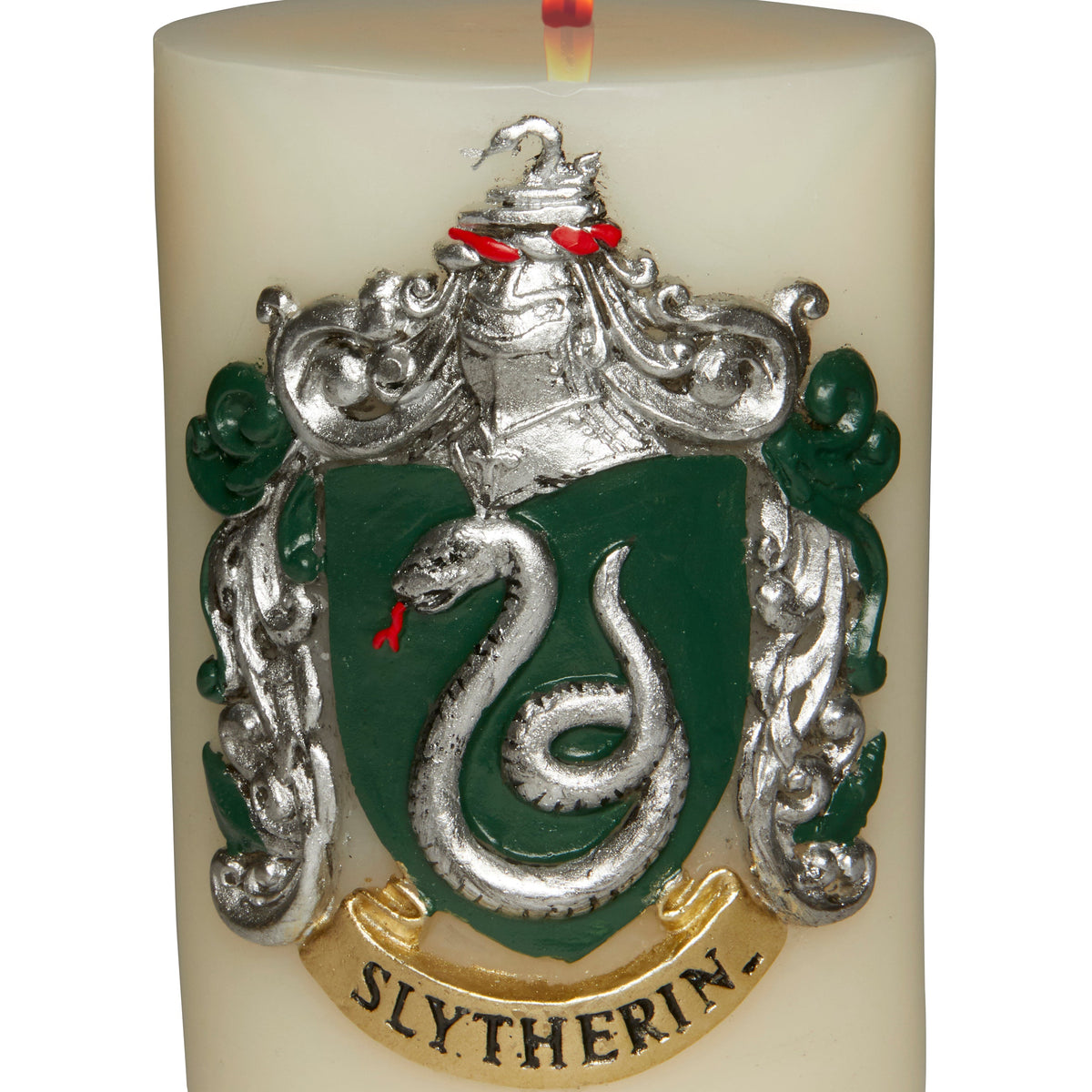 Slytherin crest sculpted candle from Harry Potter, Insight Editions, featuring detailed green and silver Slytherin insignia on a home decor candle